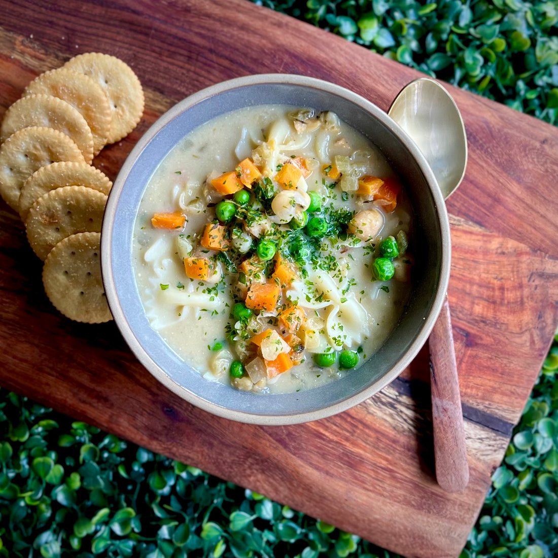 Chickpeas and Noodle Soup:Brothy, steamy, and satisfying comfort soup of succulent chickpeas, chewy noodles, slowly simmered in vegetable broth with carrots and celery, rosemary and thyme.